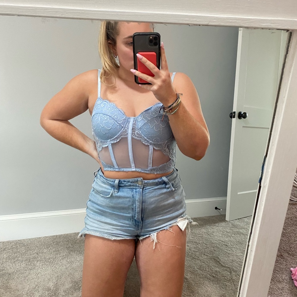 Blue corset top. Ajustable straps - worn 2 times size Large